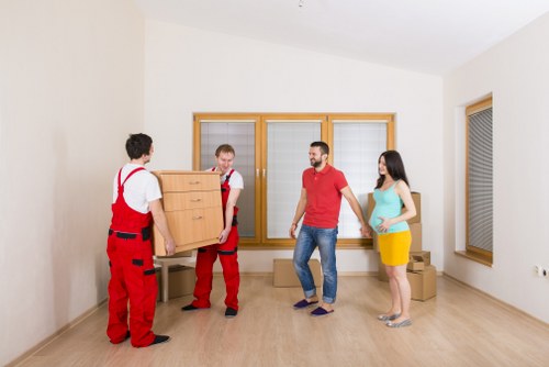 Packing team organizing household items for a smooth move in Shacklewell