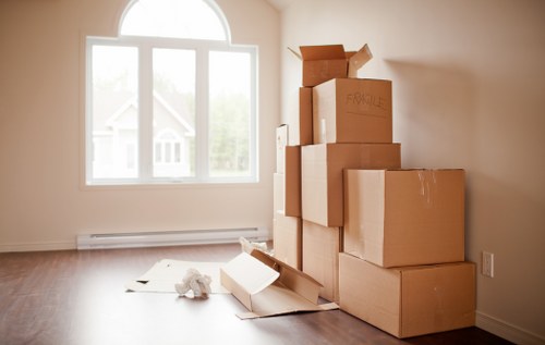 Packed boxes and furniture ready for mobile storage in Shacklewell