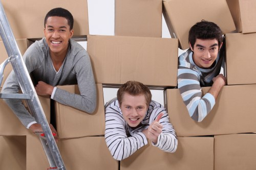 Professional office relocation preparation with boxes and equipment in Shacklewell
